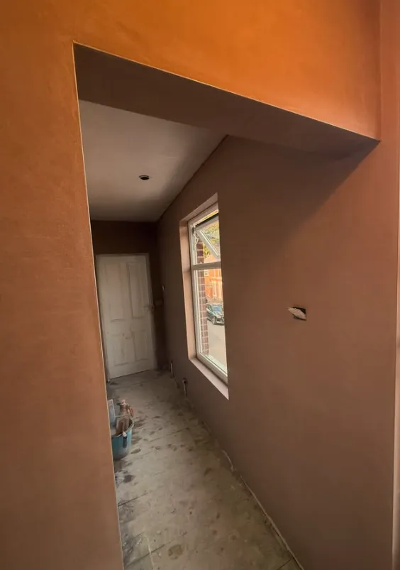 Plastered hallway and doorway